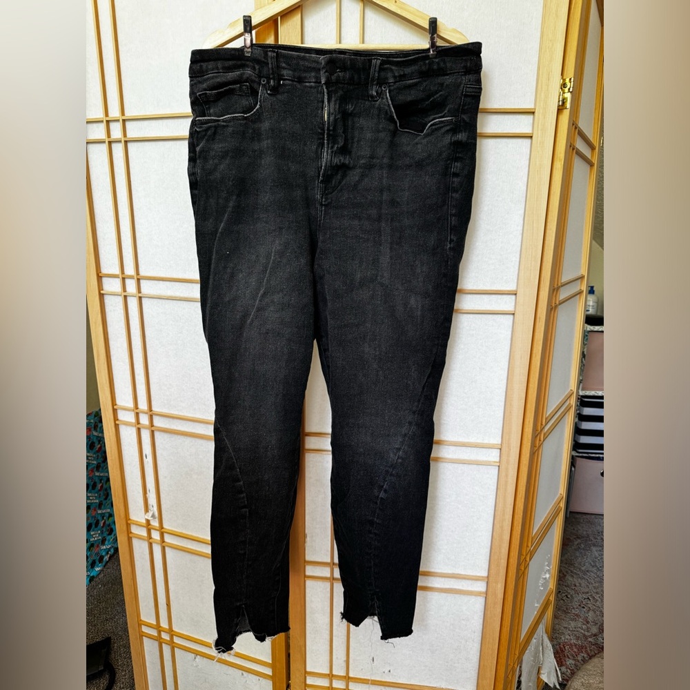Good American gray jeans with embellished seam and distressed ankles